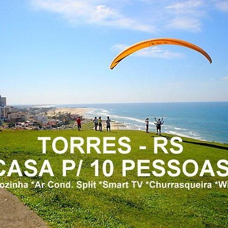 Вилла Casa De 2 Quartos Com 2 Ares-Condicionados Em Torres-Rs - Na Mais Bela Praia Gaucha - Cozinha - Banheiro - Tv Smart 32 E Wi-Fi - Estacionamento - Anfitria Superhost No Bnb Экстерьер фото