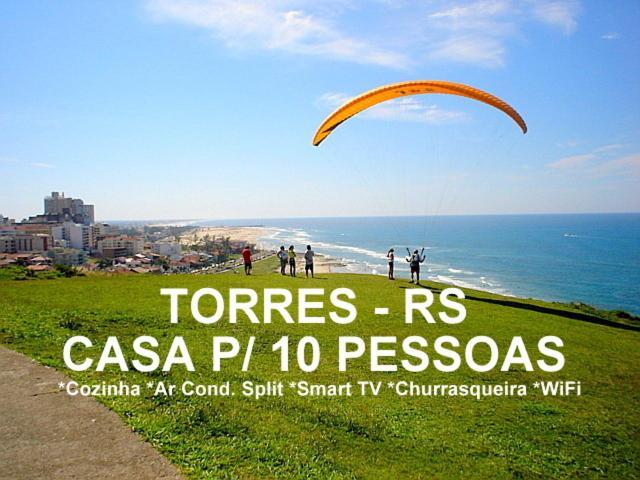 Вилла Casa De 2 Quartos Com 2 Ares-Condicionados Em Torres-Rs - Na Mais Bela Praia Gaucha - Cozinha - Banheiro - Tv Smart 32 E Wi-Fi - Estacionamento - Anfitria Superhost No Bnb Экстерьер фото